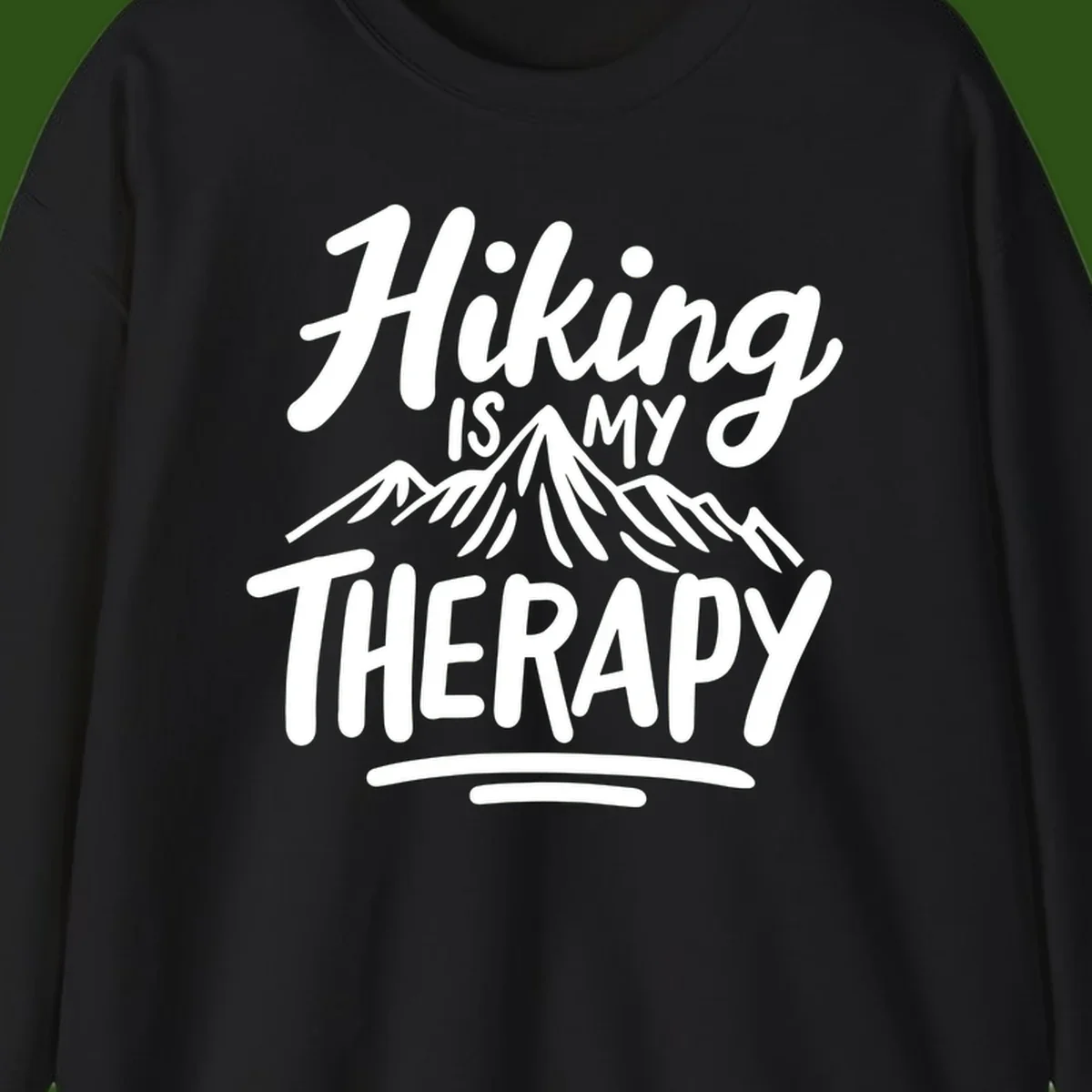 White text reading 'Hiking is MY THERAPY' with illustrated mountain range, on gray background