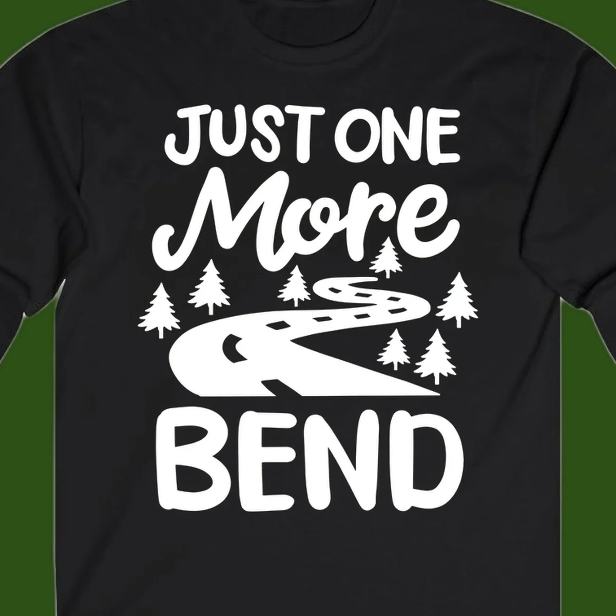 White design on gray background showing a winding road through evergreen trees with cursive text reading 'Just One More Bend'
