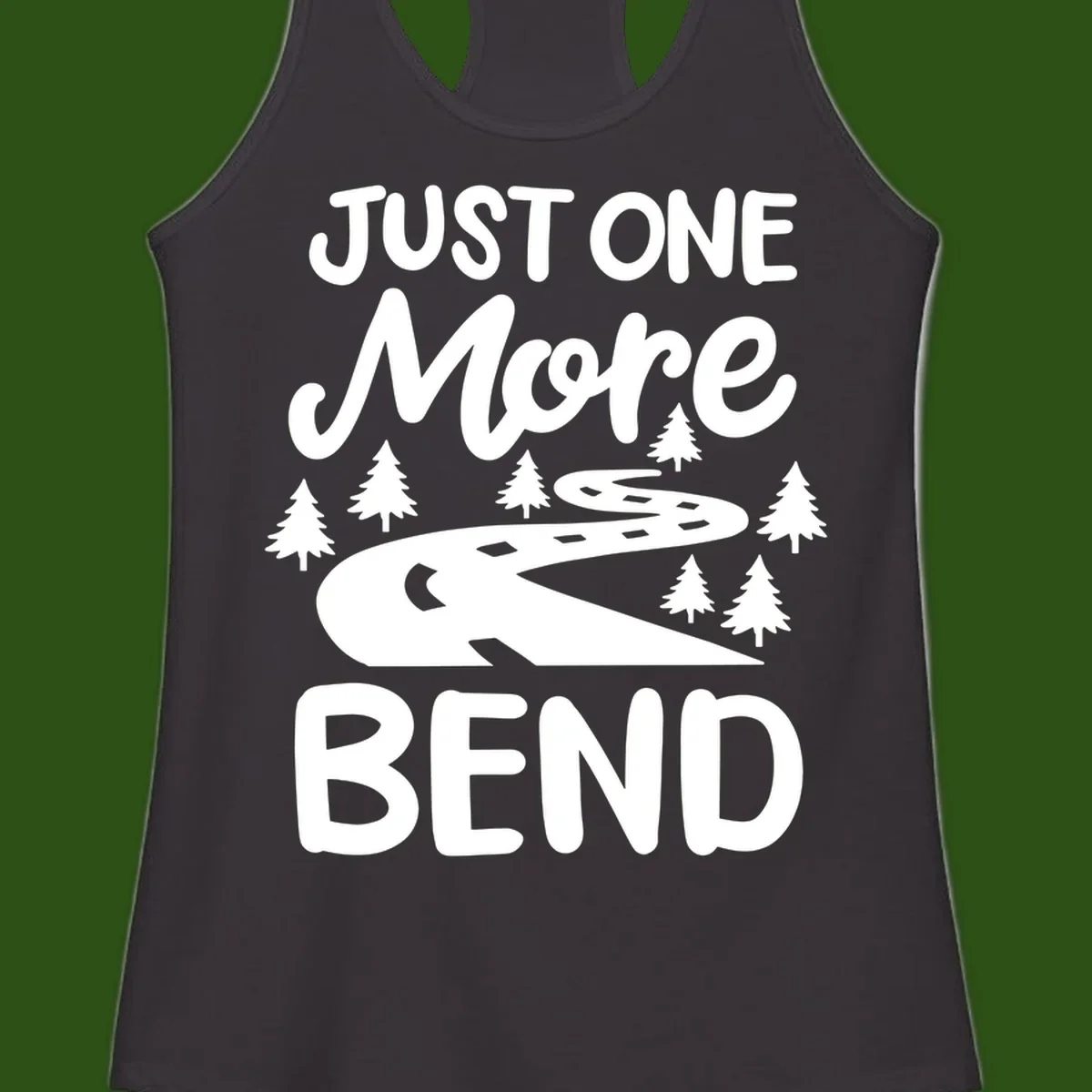 White design on gray background showing a winding road through evergreen trees with cursive text reading 'Just One More Bend'