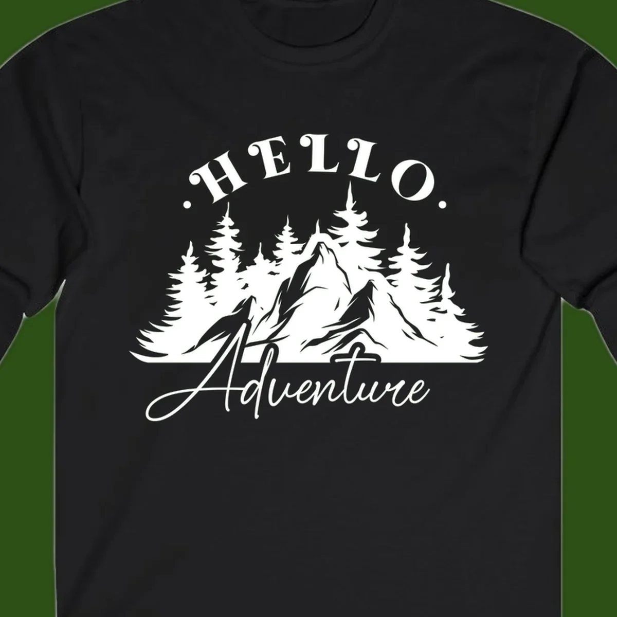 Hello adventure mountain design featuring snow-capped peak and evergreen forest silhouette in white and gray