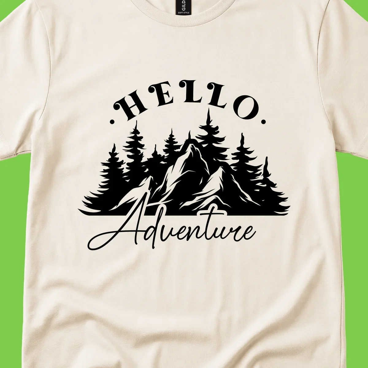 Hello adventure mountain design featuring snow-capped peak and evergreen forest silhouette in white and gray
