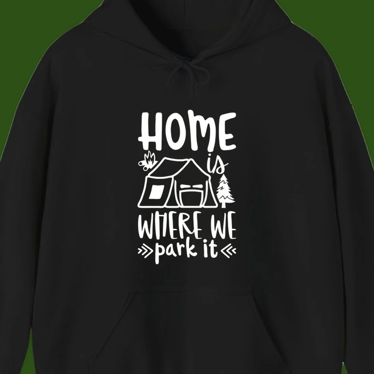 Home is where we park it camping design with tent, campfire, and evergreen tree illustration