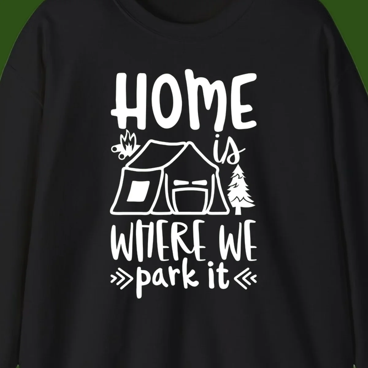 Home is where we park it camping design with tent, campfire, and evergreen tree illustration