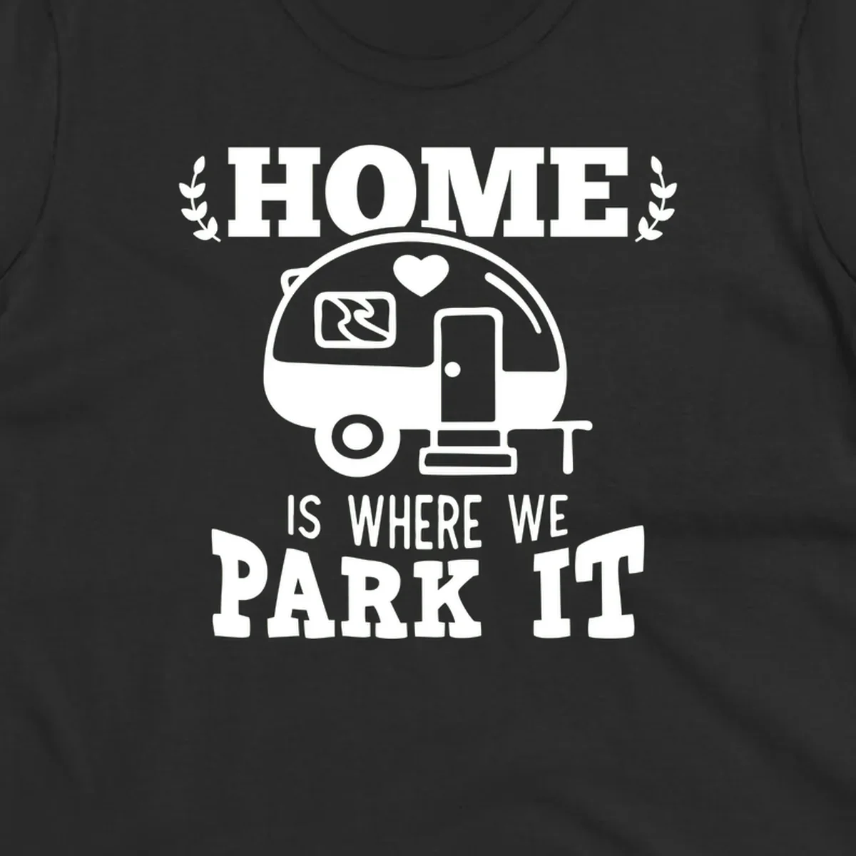 Vintage travel trailer illustration with 'Home Is Where We Park It' text and laurel wreaths on gray background
