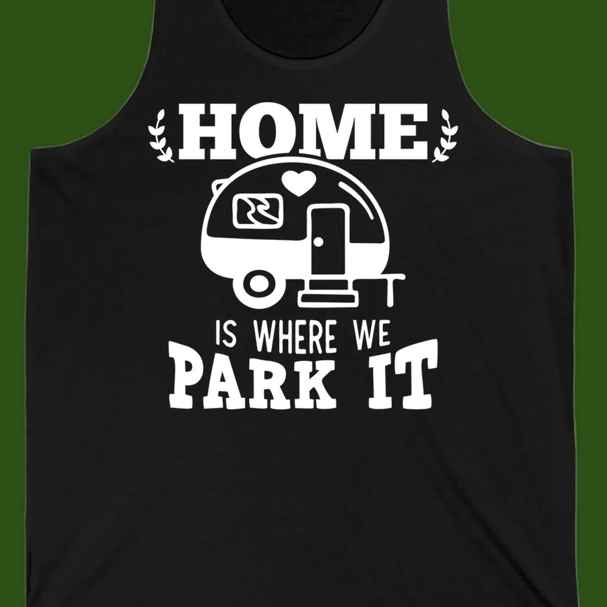 Vintage travel trailer illustration with 'Home Is Where We Park It' text and laurel wreaths on gray background