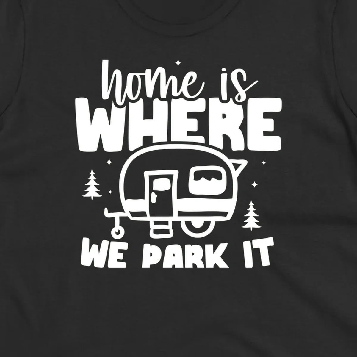 Retro-style design with 'home is where we park it' text and vintage travel trailer illustration surrounded by pine trees and sparkles