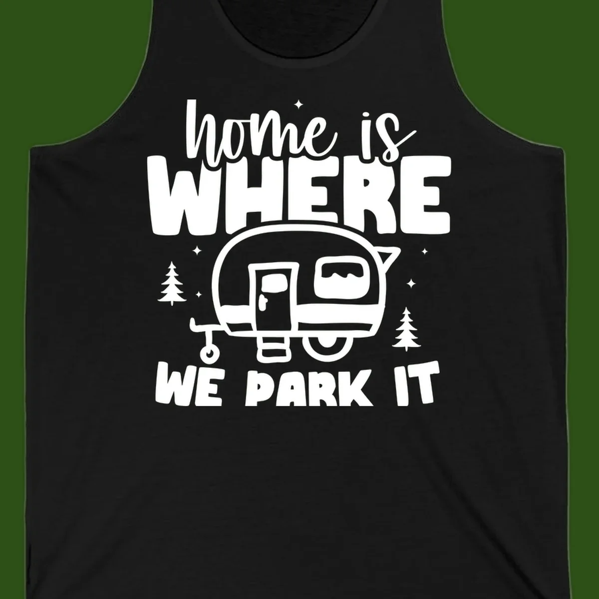 Retro-style design with 'home is where we park it' text and vintage travel trailer illustration surrounded by pine trees and sparkles