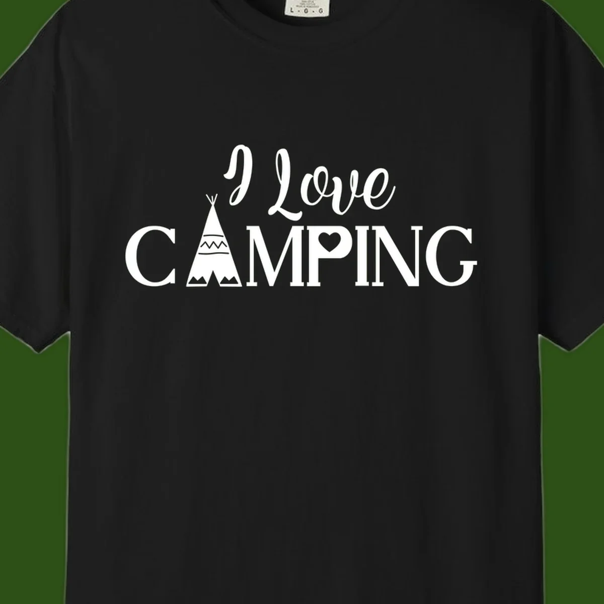 White i-love-camping-teepee design on gray background with decorative geometric patterns and heart symbol