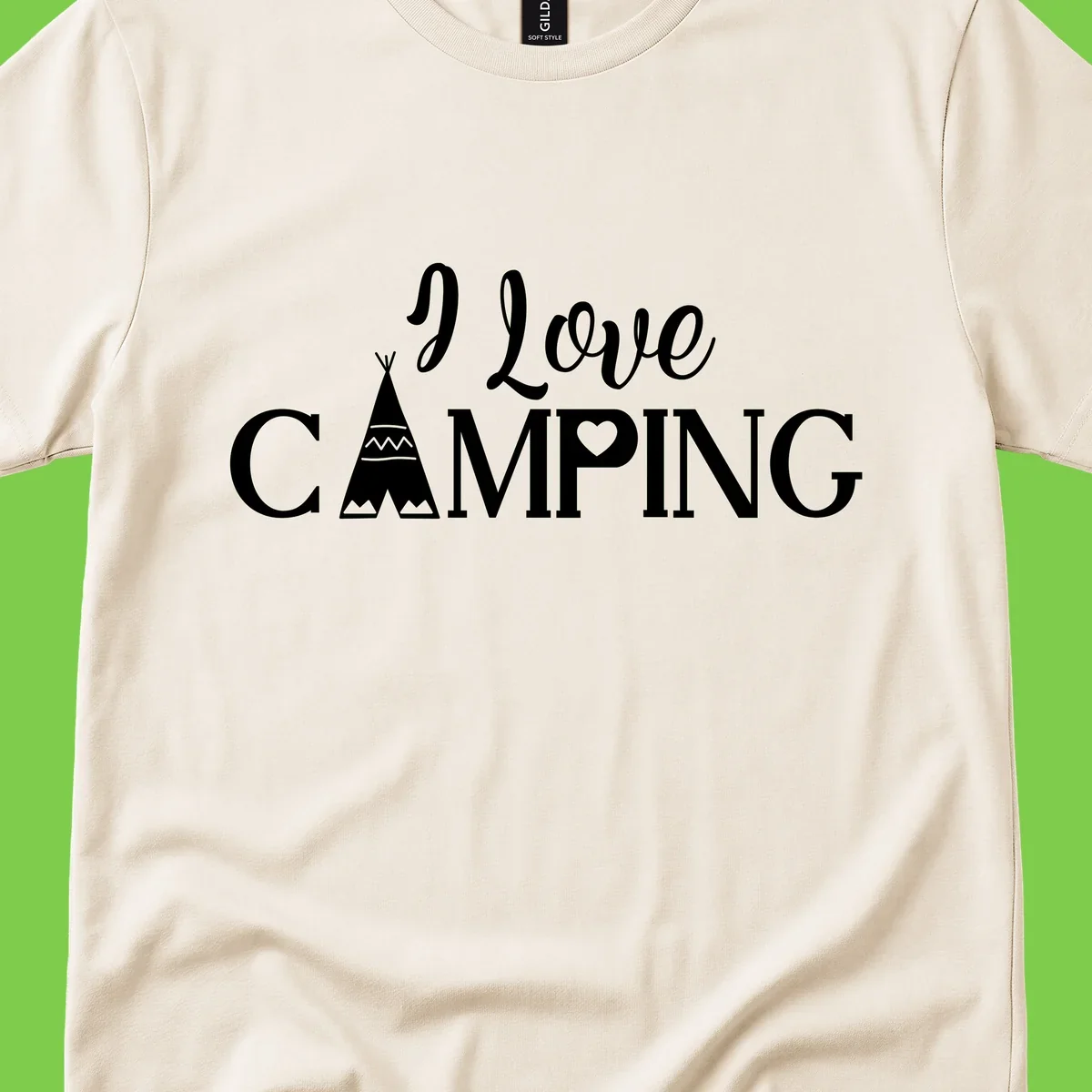 White i-love-camping-teepee design on gray background with decorative geometric patterns and heart symbol