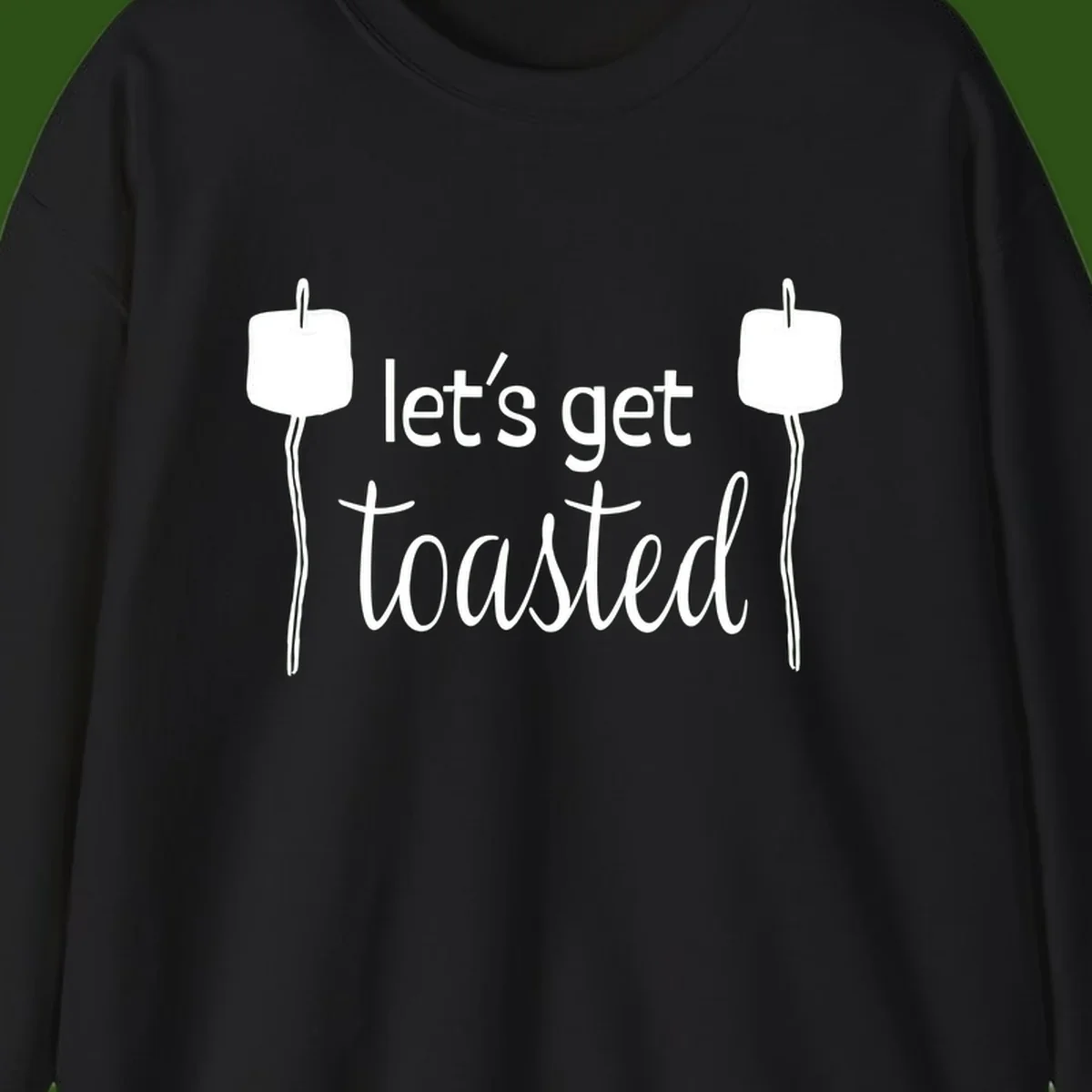Illustration of two roasting sticks with marshmallows and text reading 'let's get toasted' in a minimalist camping design