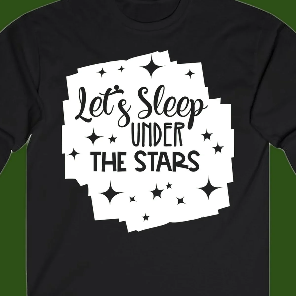 Whimsical design with 'Let's Sleep Under The Stars' text surrounded by sparkles and stars, evoking a cozy camping night.