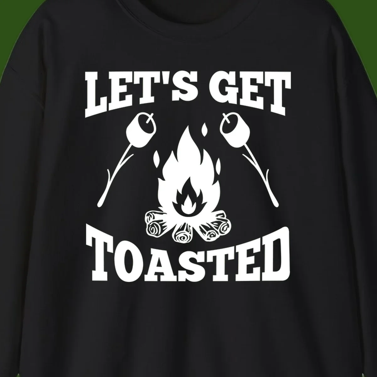 Campfire illustration with roasting sticks and marshmallows, text reads 'Let's Get Toasted'