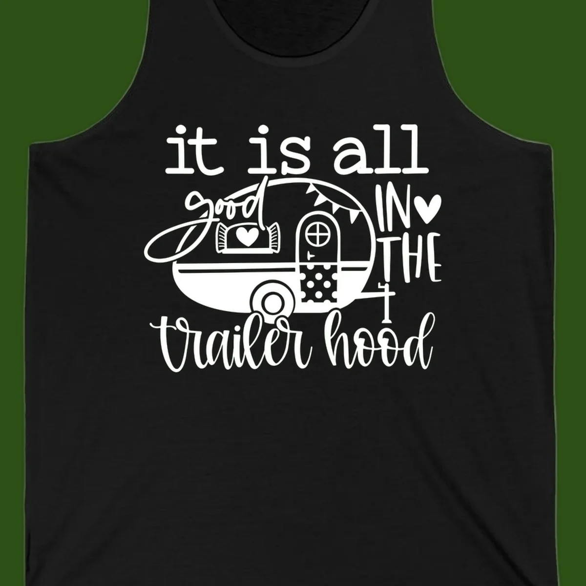 Vintage trailer illustration with decorative hearts and bunting, text reading 'it is all good in the trailer hood' in retro style