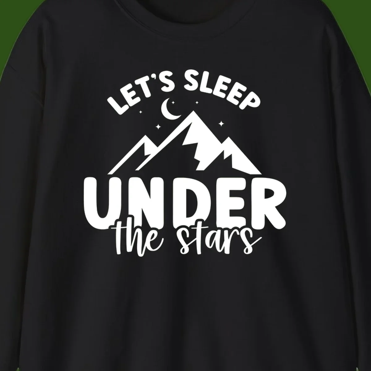 White illustration of jagged mountains with lightning bolts under a crescent moon and stars, with text reading 'Let's Sleep Under the stars'