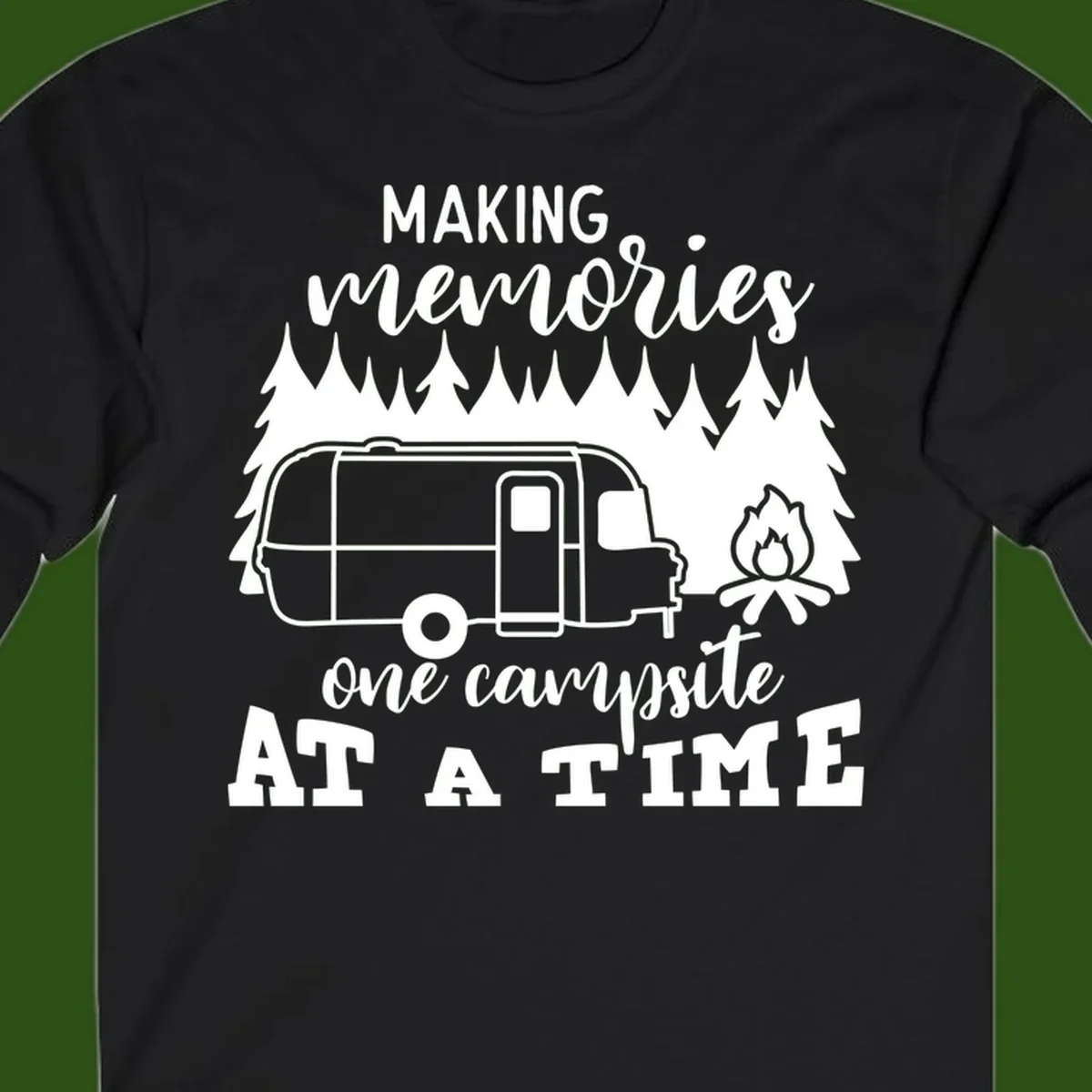 Vintage Airstream trailer parked among evergreen trees with a campfire, text reading Making Memories One Campsite At A Time