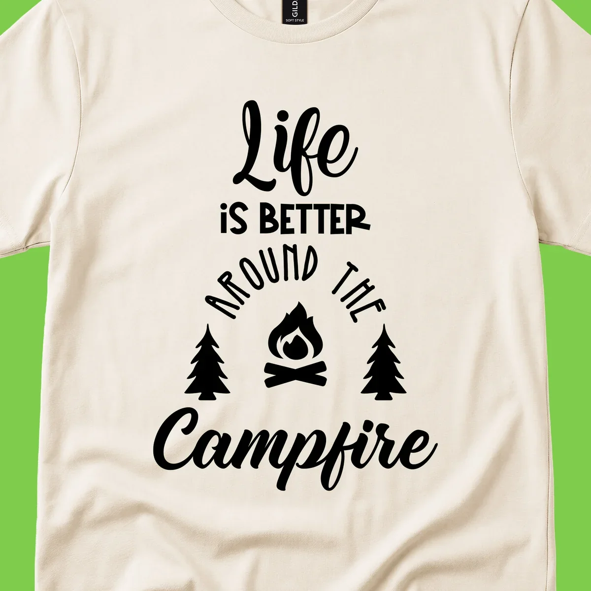 White lettering and campfire graphic with pine trees on gray background reading 'Life is better around the campfire'