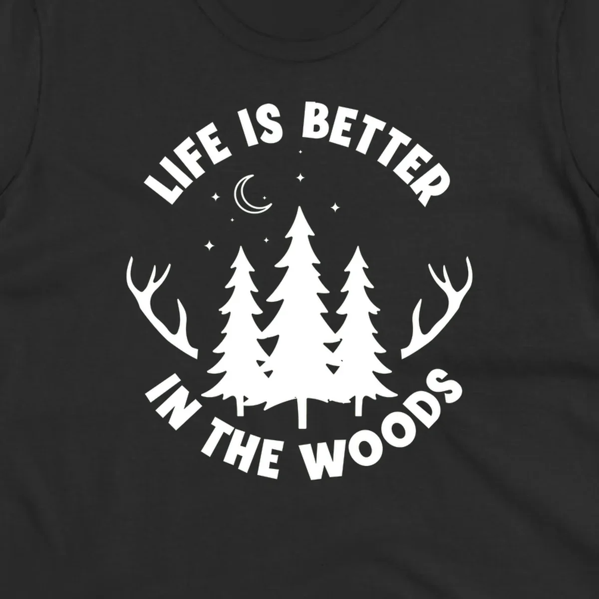 Life is better in the woods design with pine trees, deer antlers, moon and stars on gray background