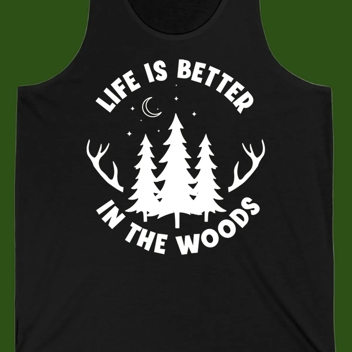 Life is better in the woods design with pine trees, deer antlers, moon and stars on gray background