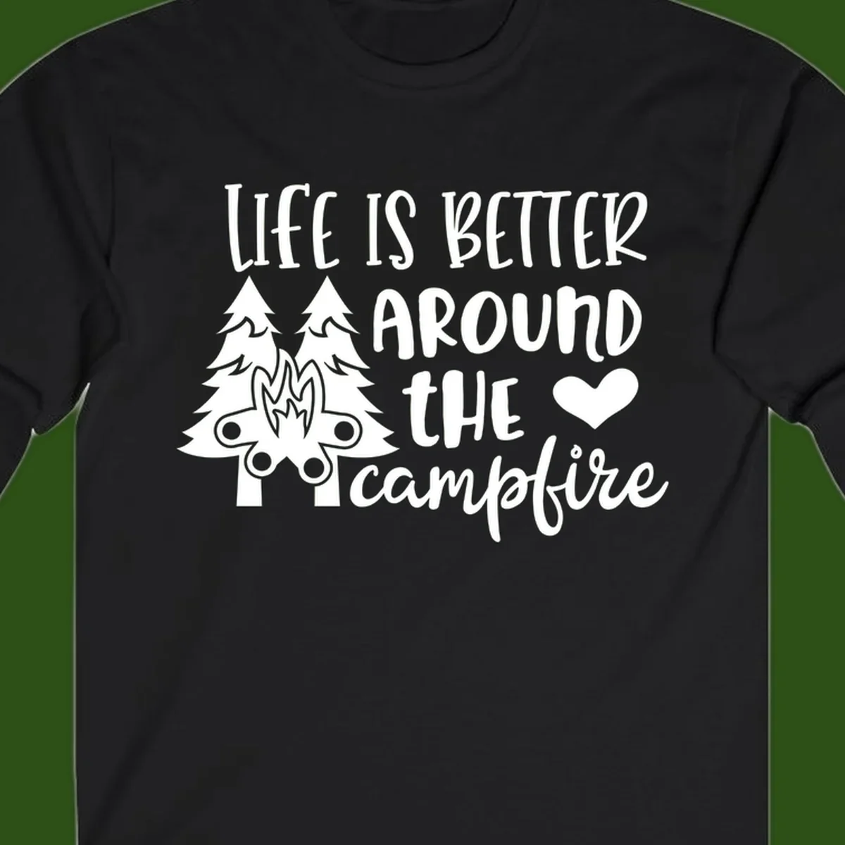 Hand-lettered design with pine trees, campfire, and heart reading 'Life Is Better Around The Campfire' on gray background