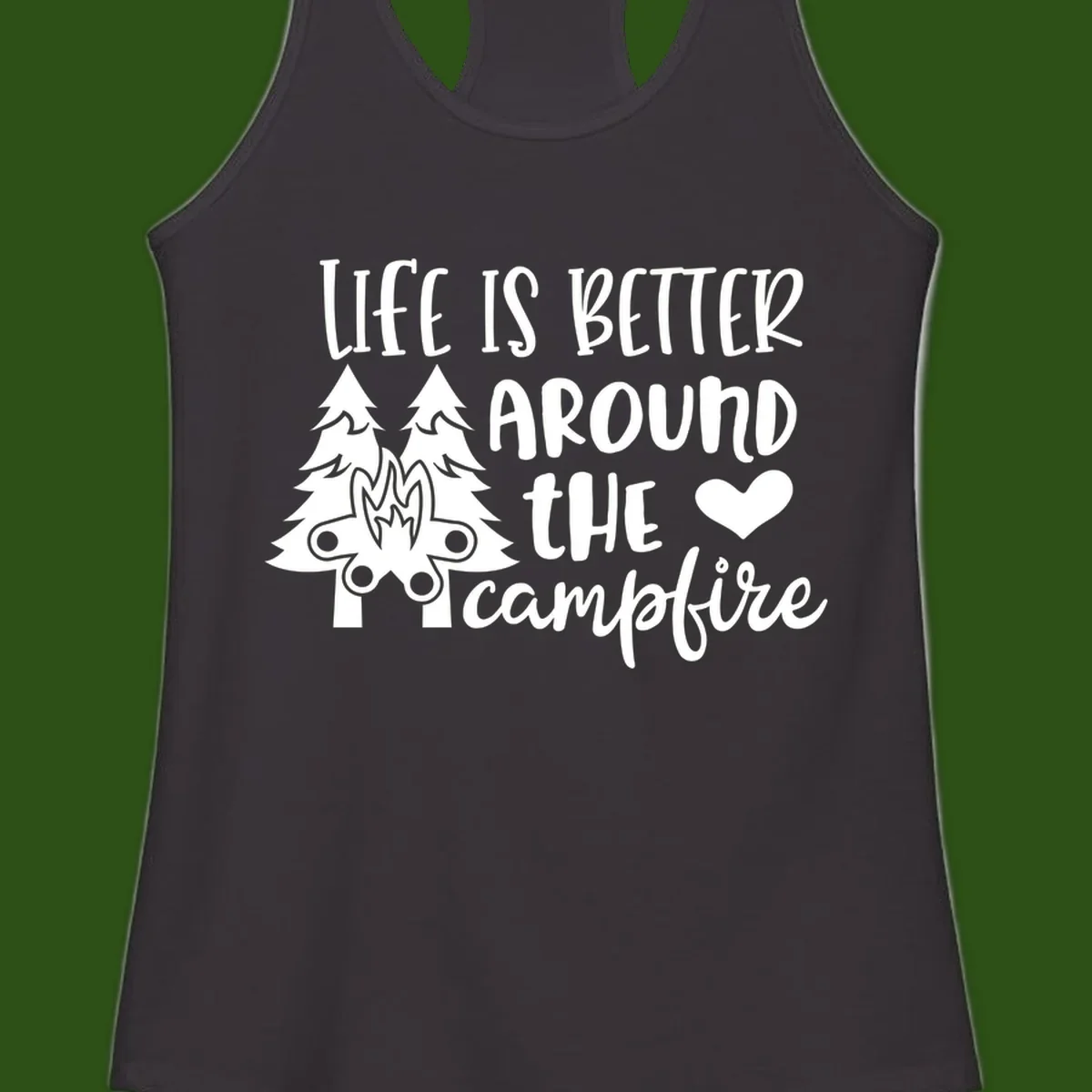 Hand-lettered design with pine trees, campfire, and heart reading 'Life Is Better Around The Campfire' on gray background