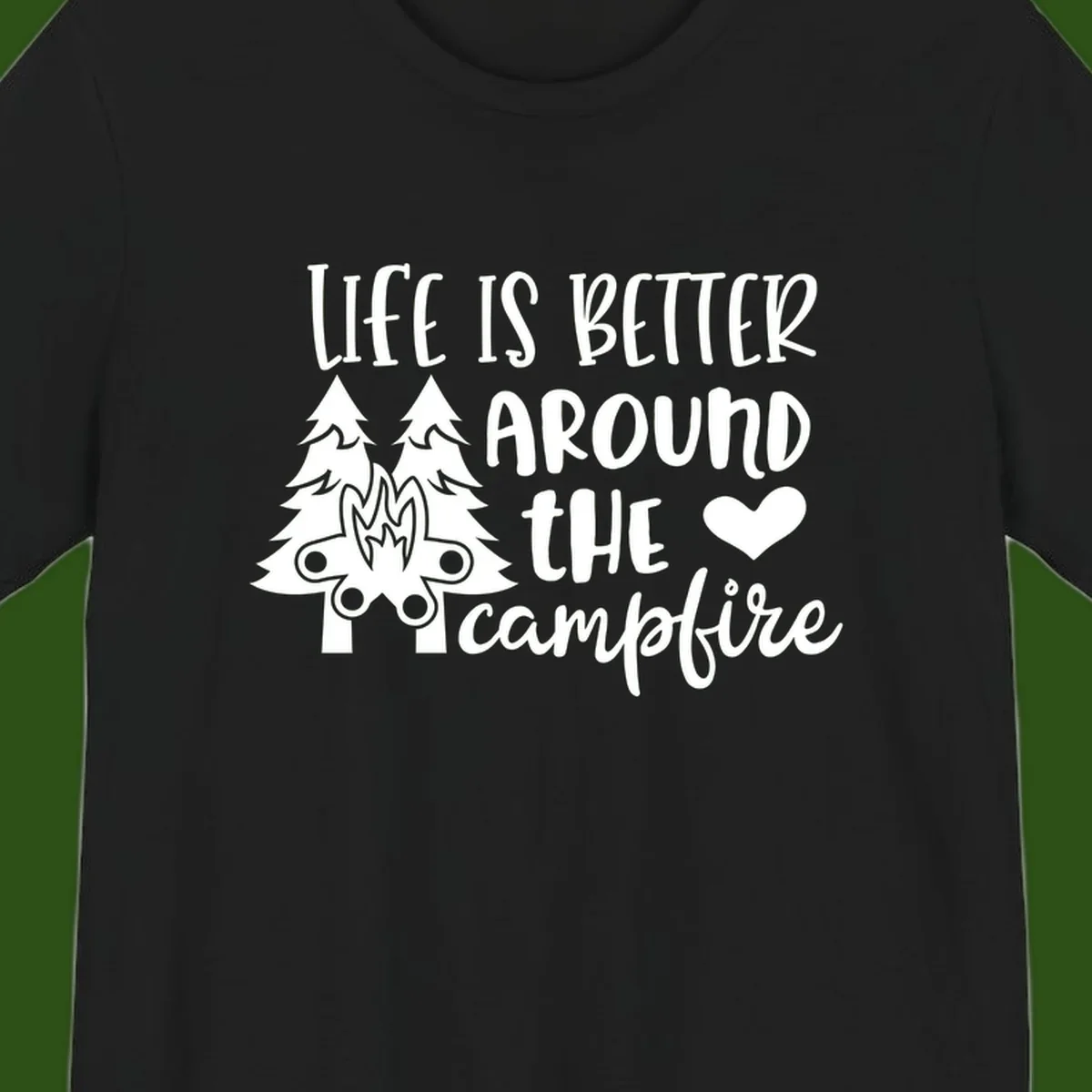 Hand-lettered design with pine trees, campfire, and heart reading 'Life Is Better Around The Campfire' on gray background