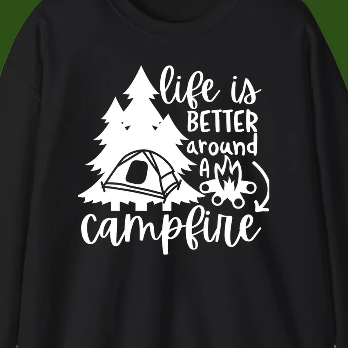 White illustration of evergreen trees, camping tent, and campfire with text reading 'life is better around a campfire' on gray background