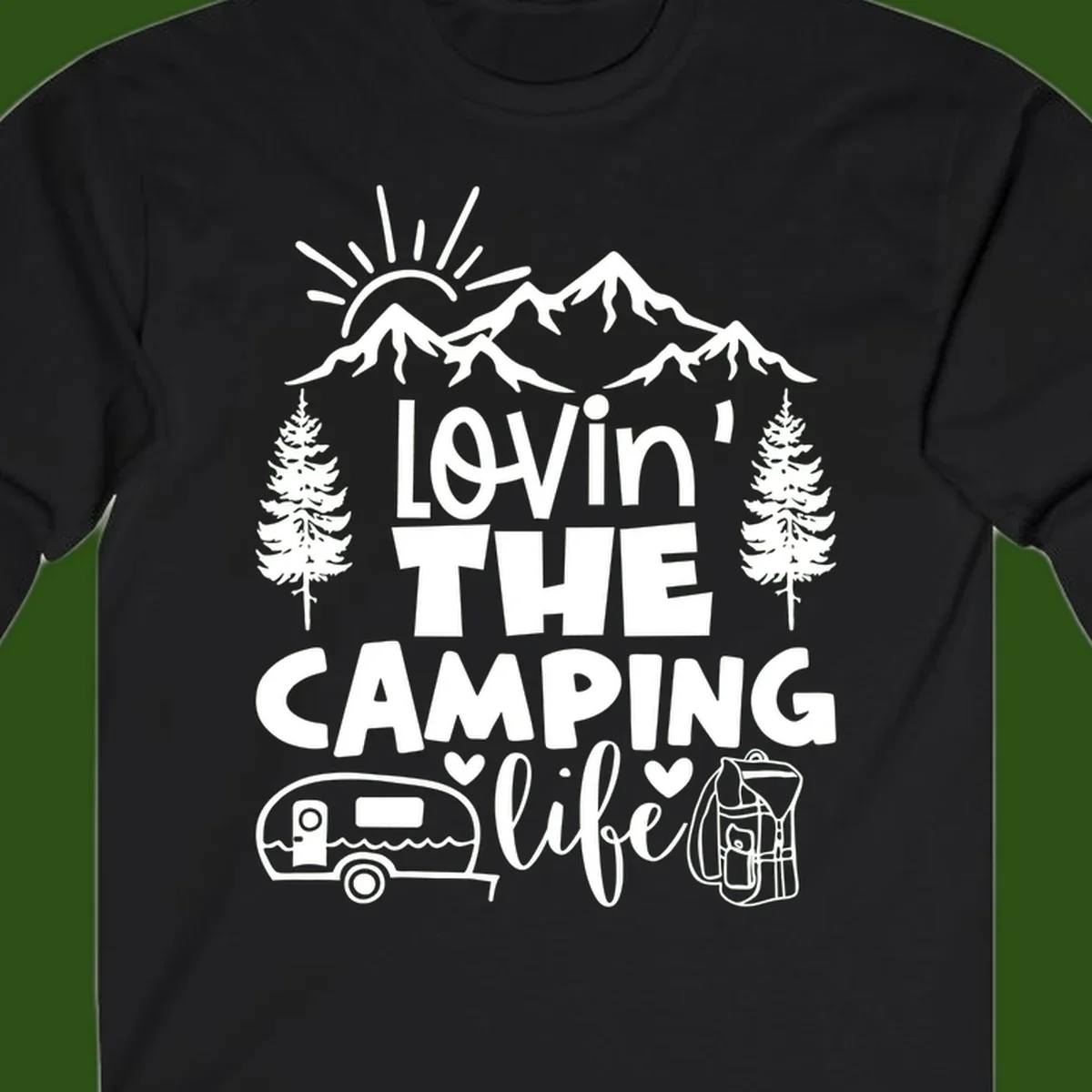 Lovin camping life design with mountains, sun, trees, RV and backpack on gray background
