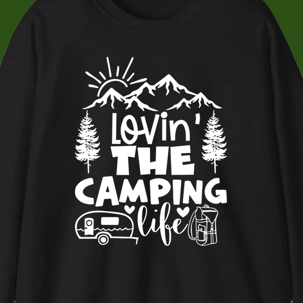 Lovin camping life design with mountains, sun, trees, RV and backpack on gray background