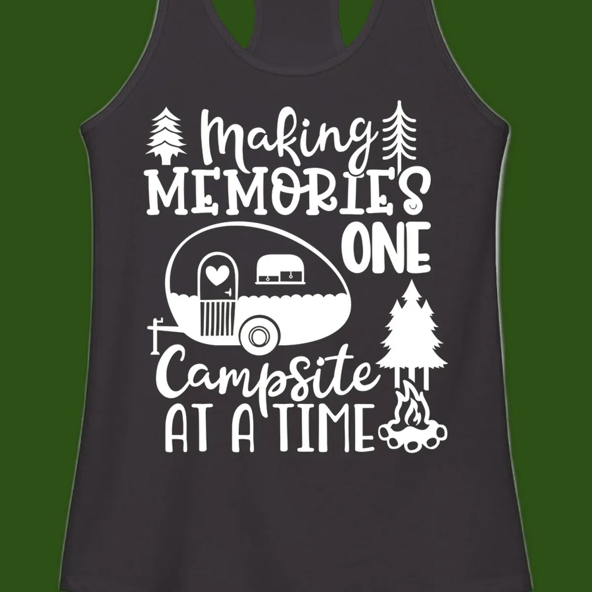Vintage camper trailer surrounded by pine trees and campfire with 'Making Memories One Campsite At A Time' text