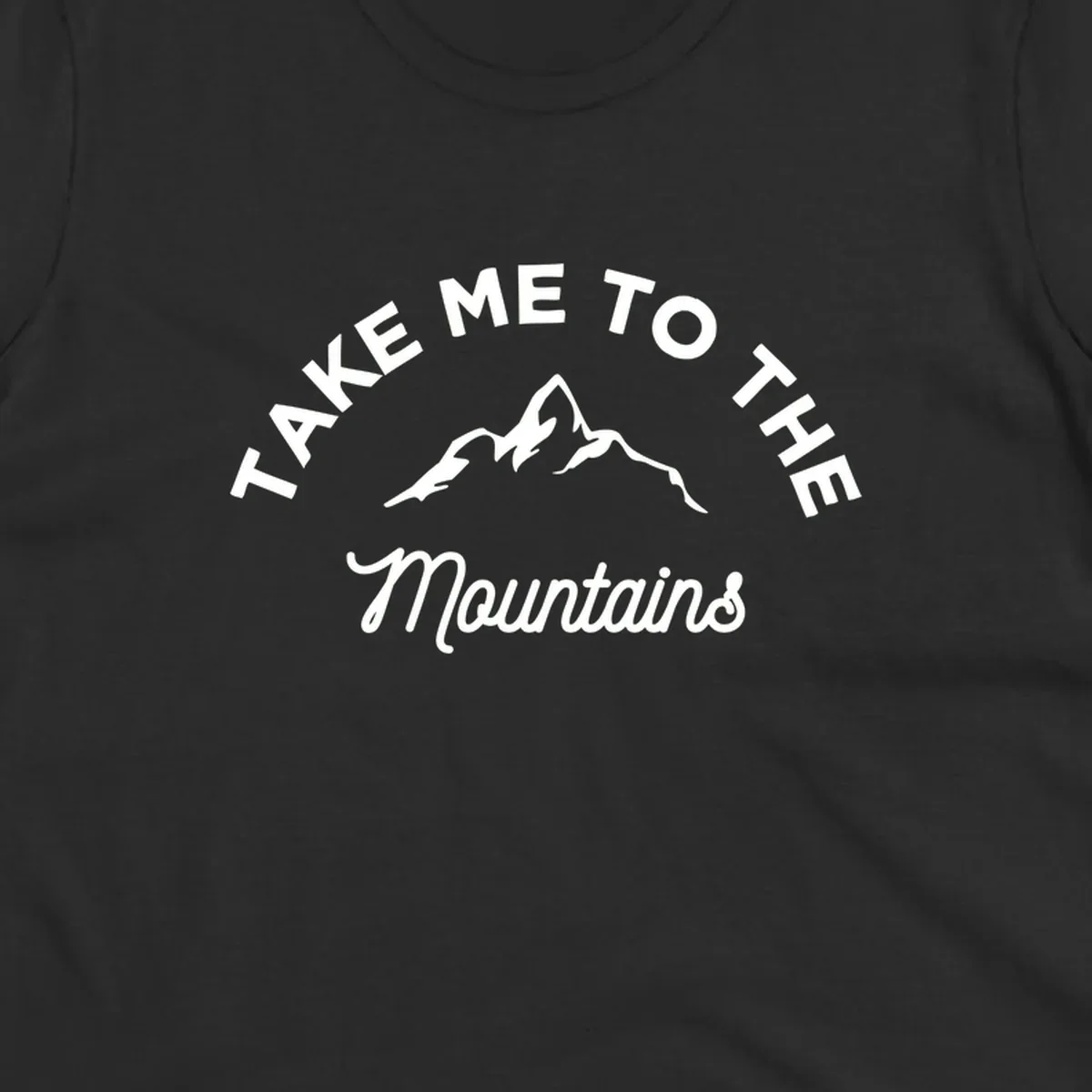 White mountain silhouette with curved text reading 'Take Me To The Mountains' on gray background