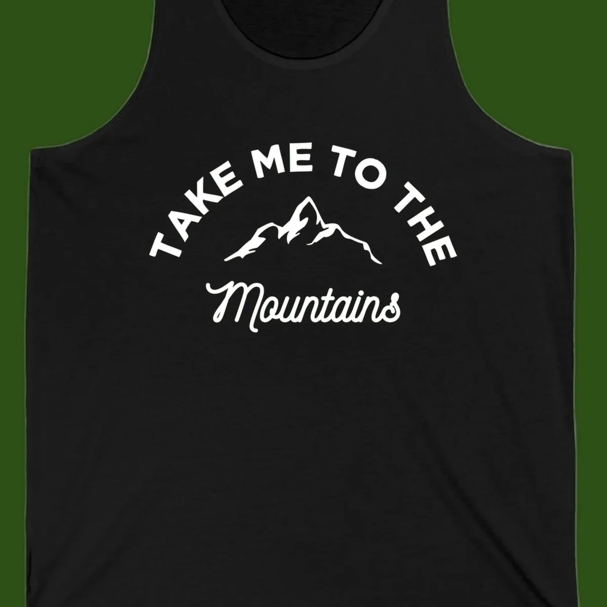 White mountain silhouette with curved text reading 'Take Me To The Mountains' on gray background