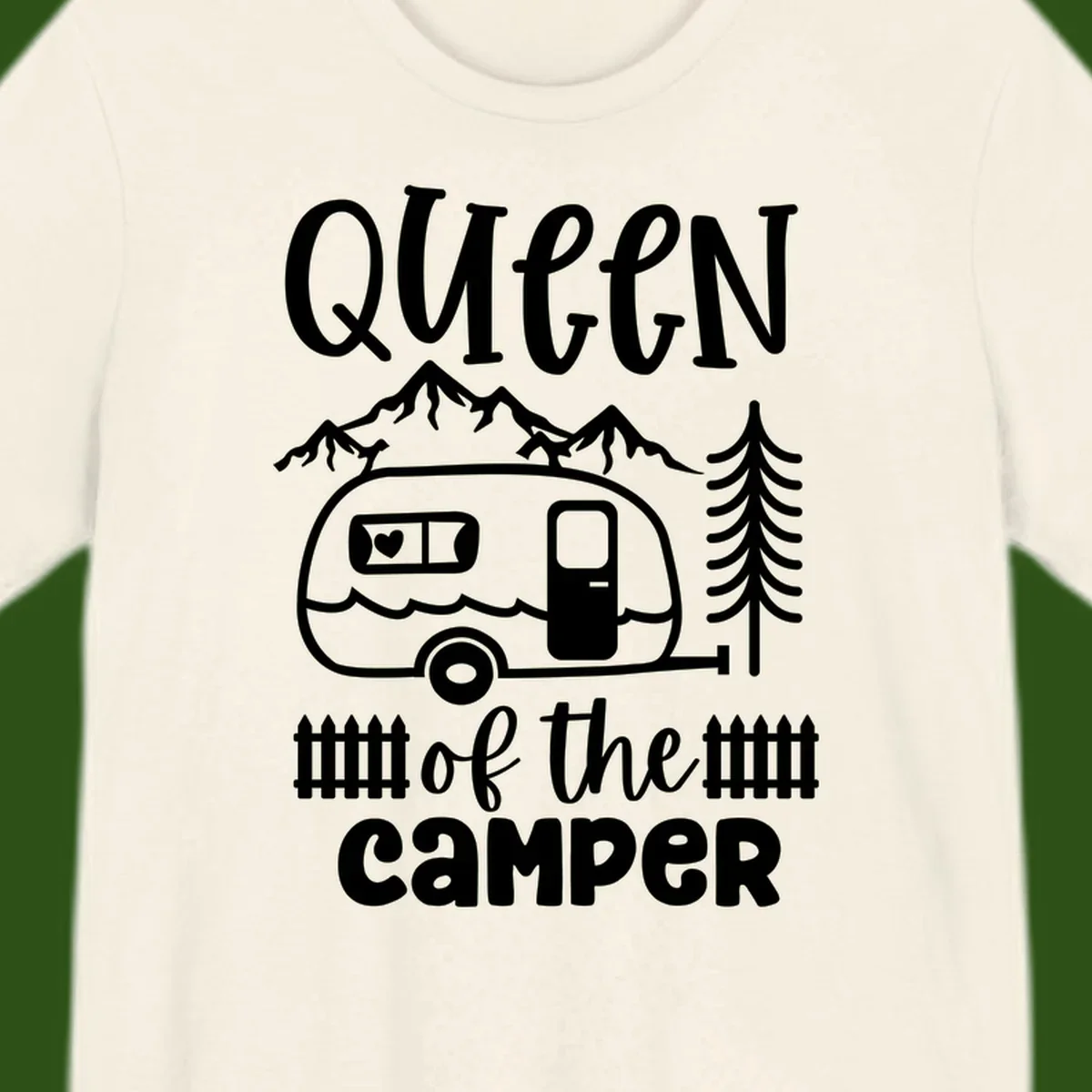 Queen of the Camper design featuring vintage trailer, mountains, and evergreen trees with bold text