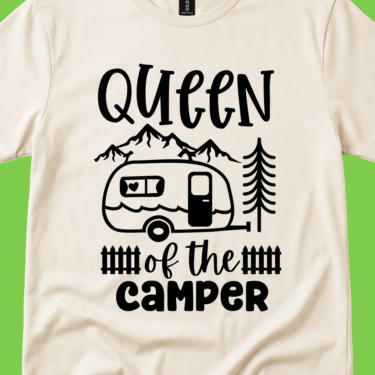 Queen of the Camper design featuring vintage trailer, mountains, and evergreen trees with bold text