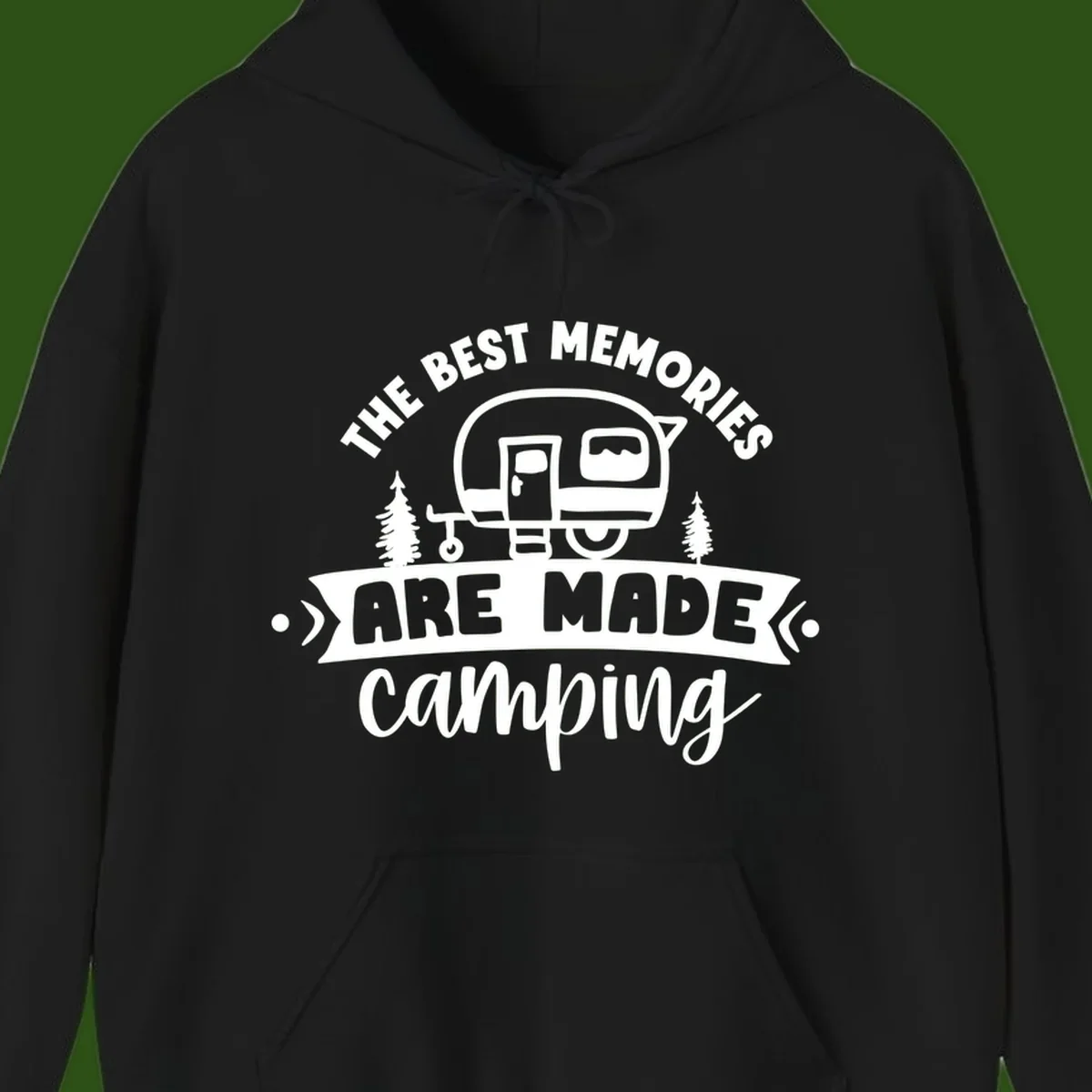 Vintage badge design with classic travel trailer, pine trees, and text reading 'The Best Memories Are Made Camping' in retro style.