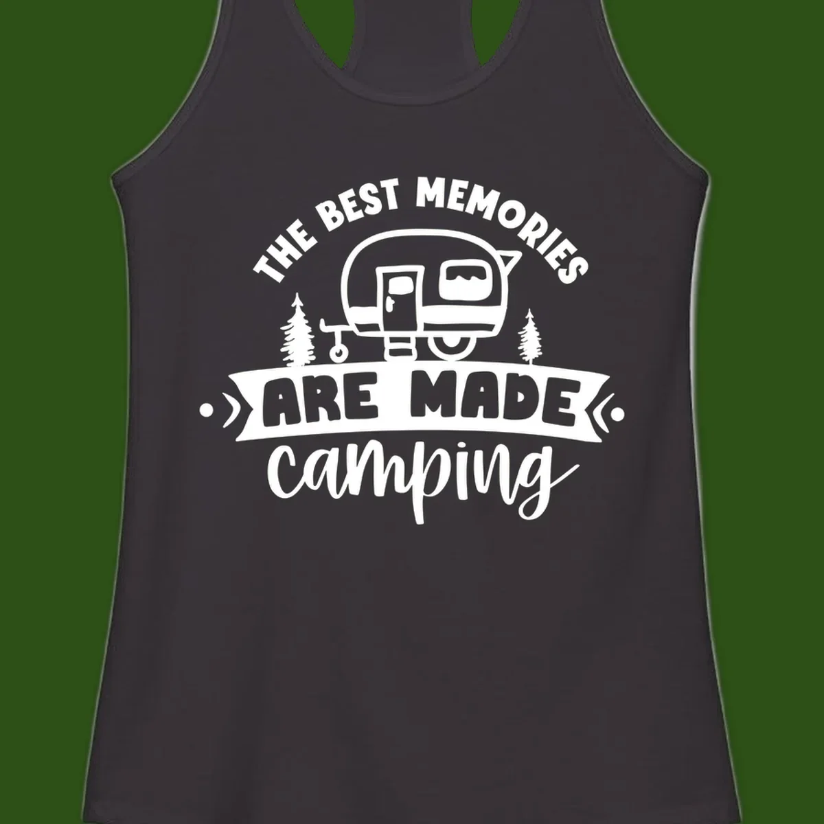 Vintage badge design with classic travel trailer, pine trees, and text reading 'The Best Memories Are Made Camping' in retro style.