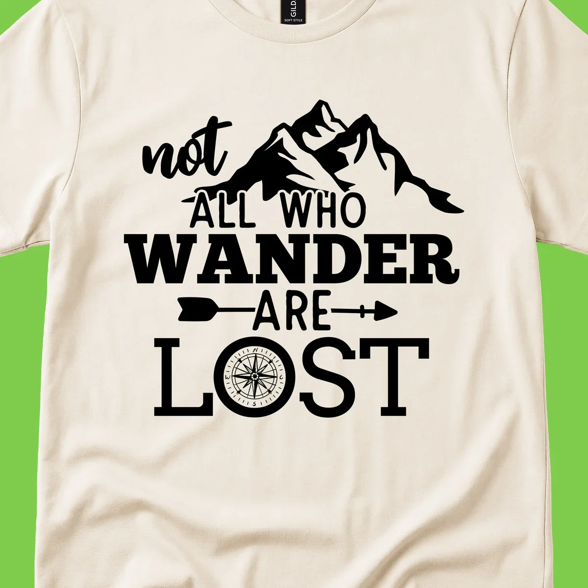 White mountain silhouette with compass rose and arrows, text reads 'not ALL WHO WANDER ARE LOST' on gray background