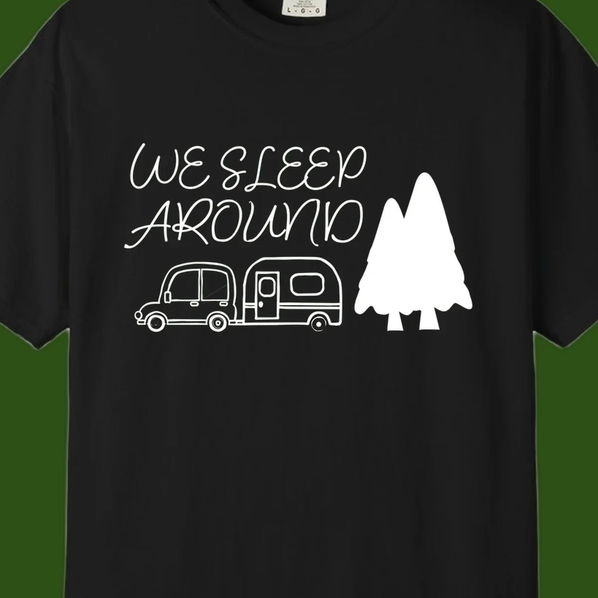 Line art design with 'We Sleep Around' text, car towing trailer, and evergreen tree on gray background