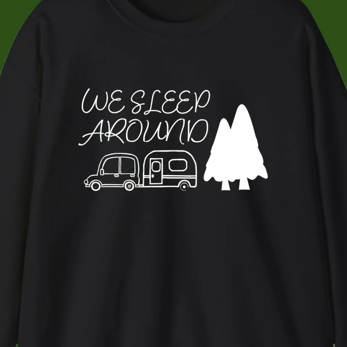 Line art design with 'We Sleep Around' text, car towing trailer, and evergreen tree on gray background