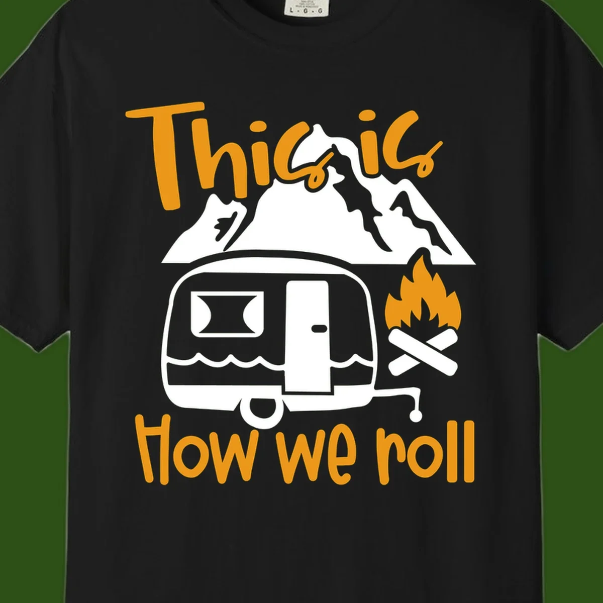 Vintage travel trailer with campfire and mountains, text reads 'This is how we roll' - camping lifestyle illustration