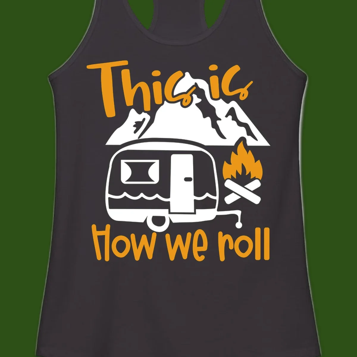 Vintage travel trailer with campfire and mountains, text reads 'This is how we roll' - camping lifestyle illustration