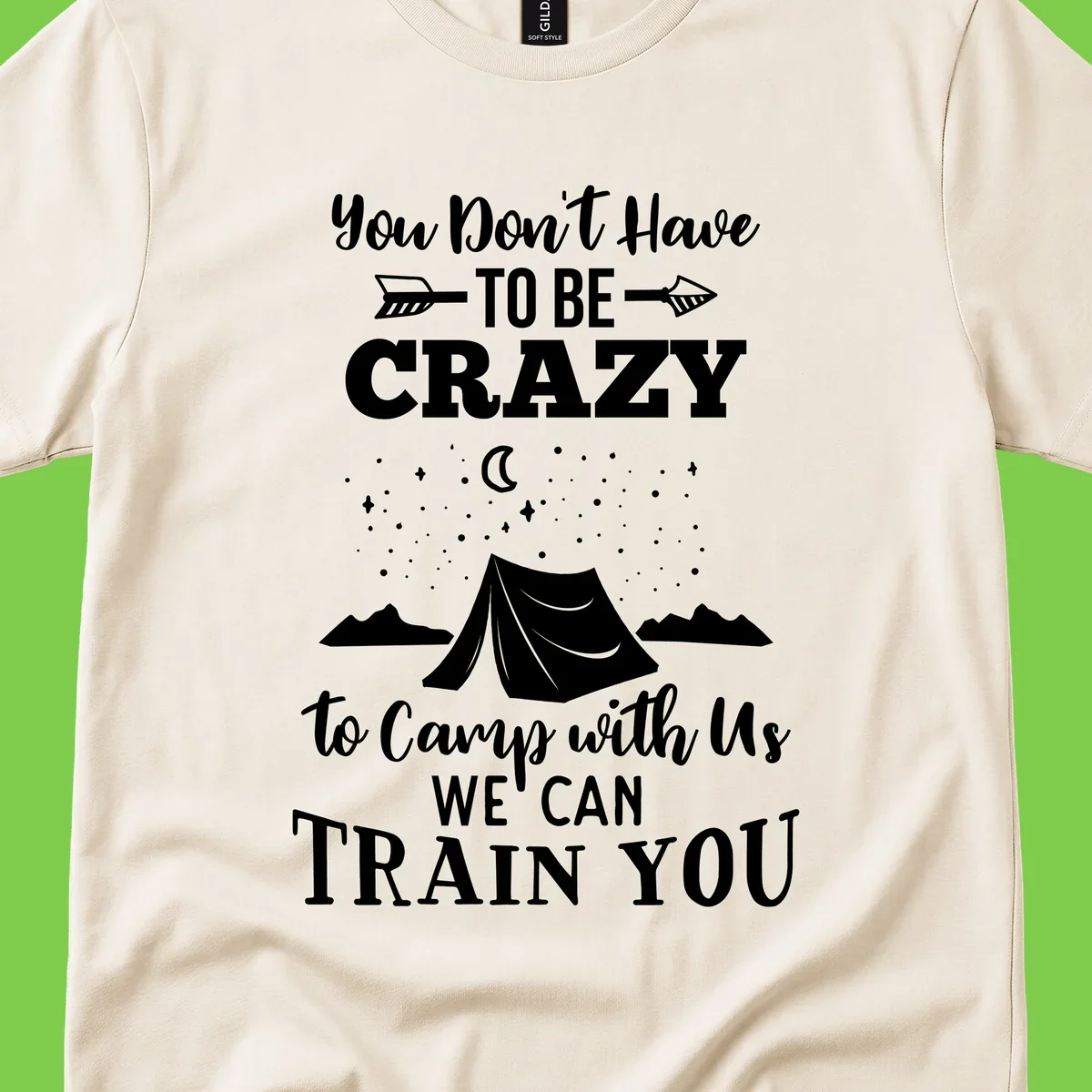 Gray design with white text reading 'You Don't Have To Be Crazy To Camp With Us We Can Train You' featuring a tent under stars and mountains