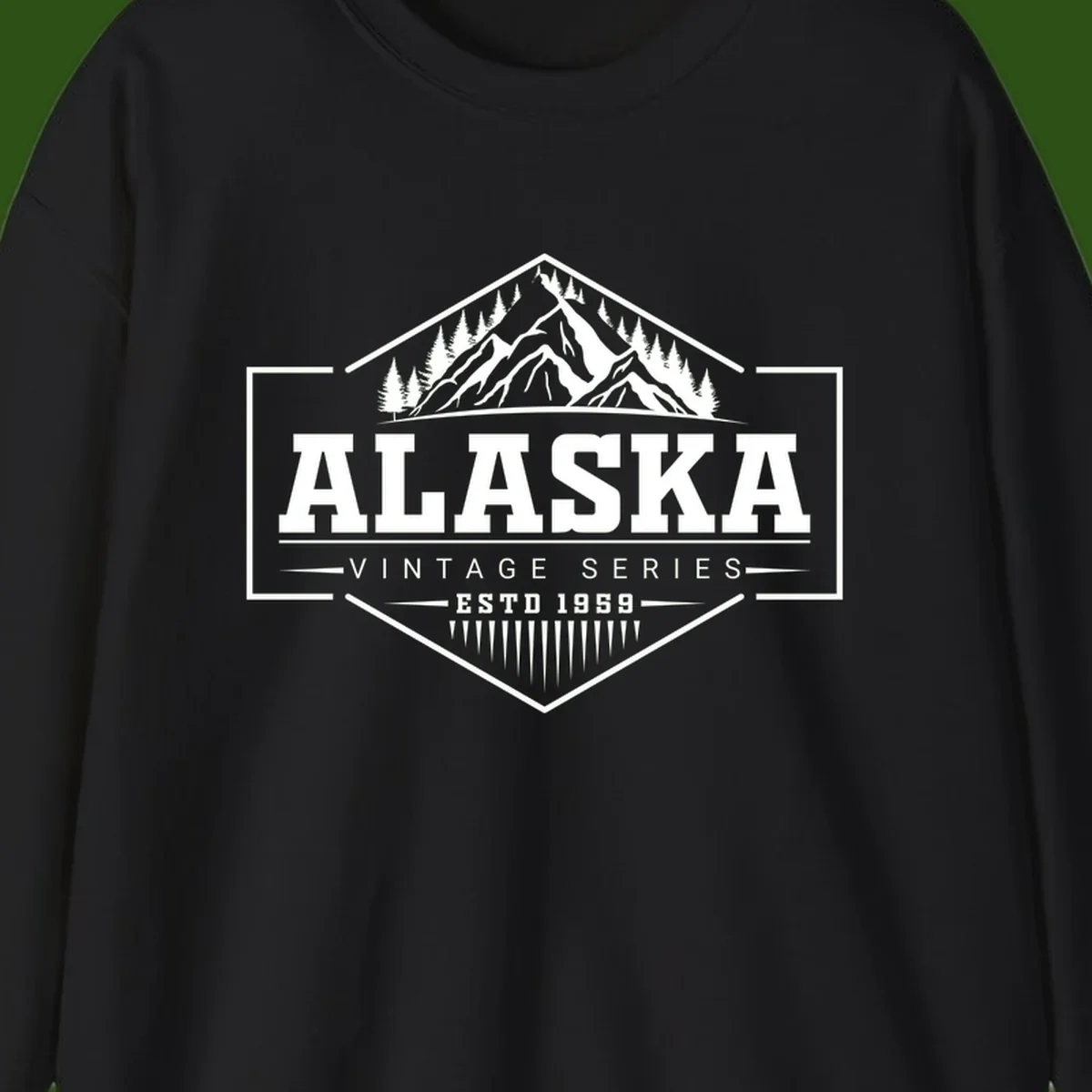 Alaska vintage mountain badge design with snow peaks, evergreen trees, and retro hexagonal patch styling