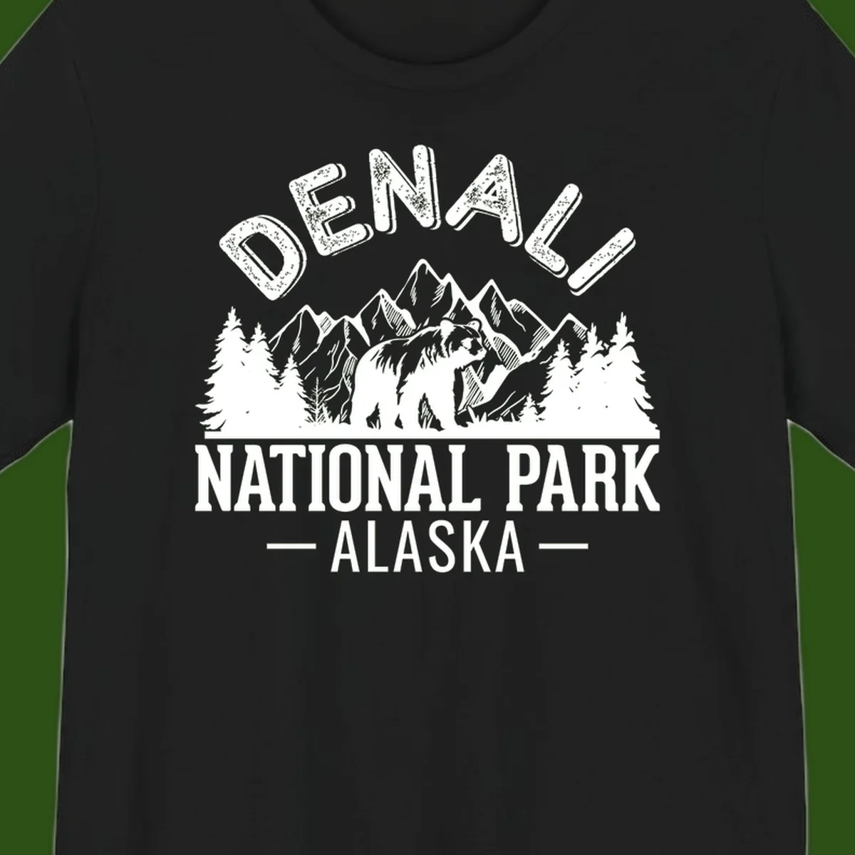 Denali National Park bear design with mountains, evergreen trees, and distressed white text on gray background