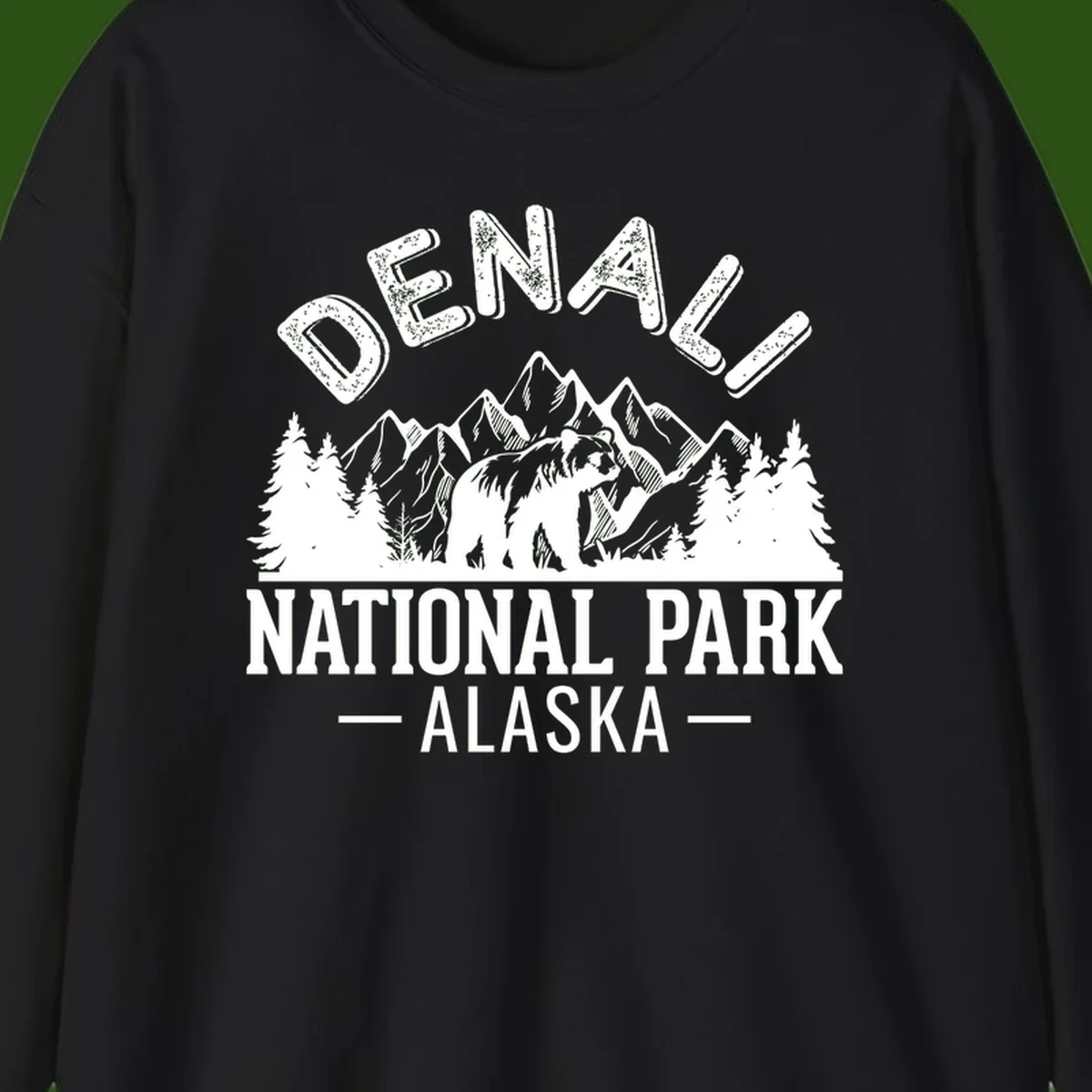 Denali National Park bear design with mountains, evergreen trees, and distressed white text on gray background