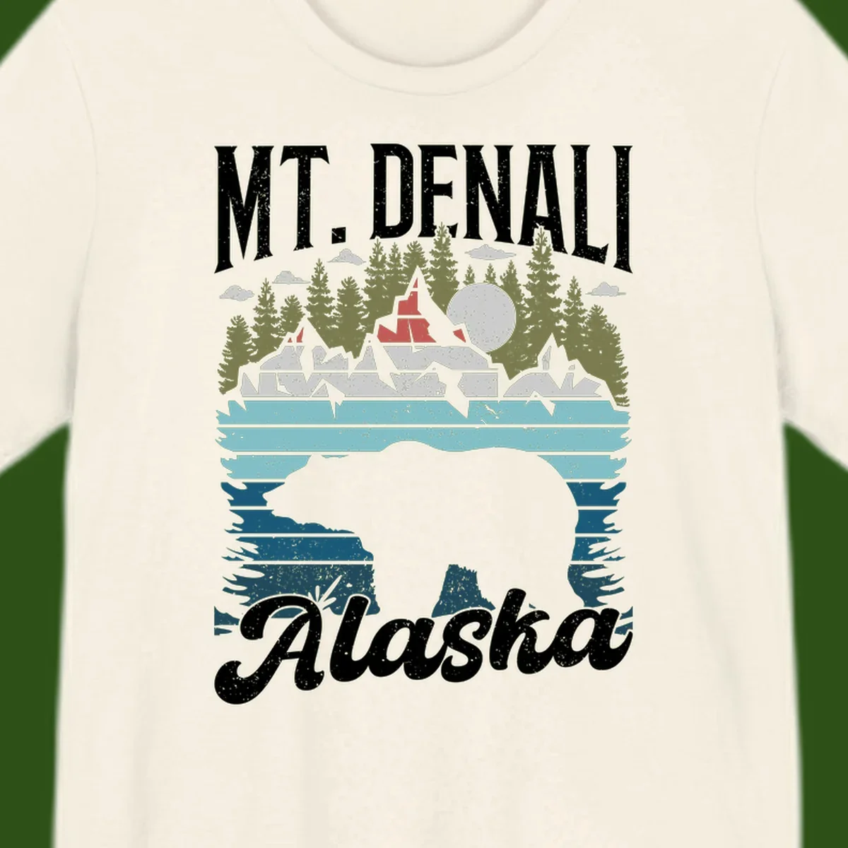 Denali bear Alaska design: layered illustration with silhouetted bear emerging from water, mountain peaks, fortress, forest, and full moon.