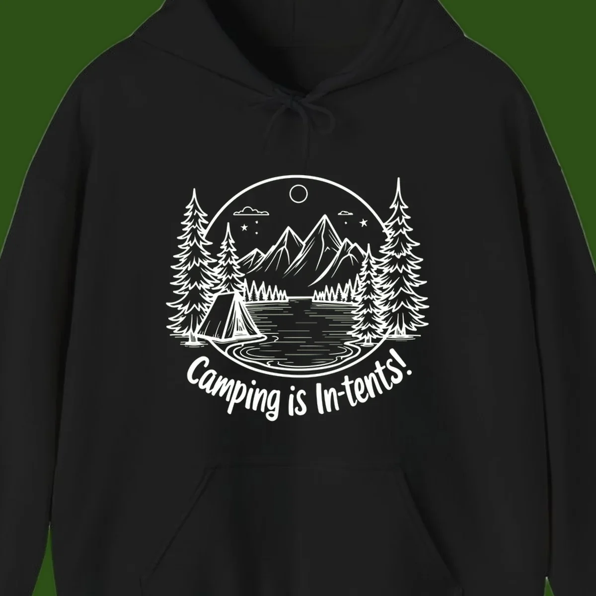 Camping is in-tents pun design: A circular badge with a tent by a lake surrounded by mountains, evergreens, and stars.