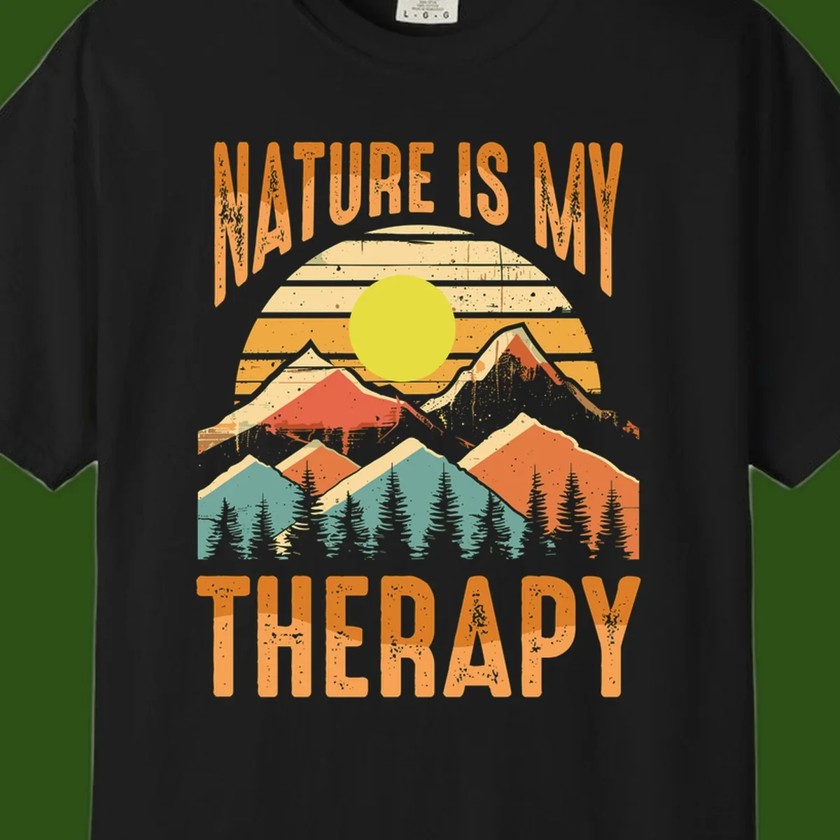 Vintage-style nature is my therapy design featuring layered mountains, sun, and forest with retro stripes and distressed texture