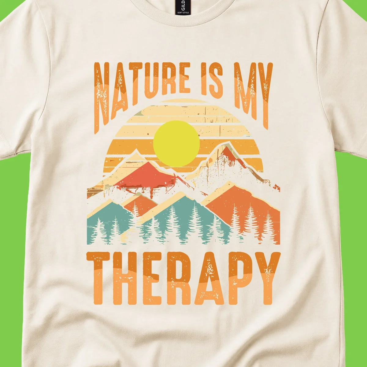 Vintage-style nature is my therapy design featuring layered mountains, sun, and forest with retro stripes and distressed texture