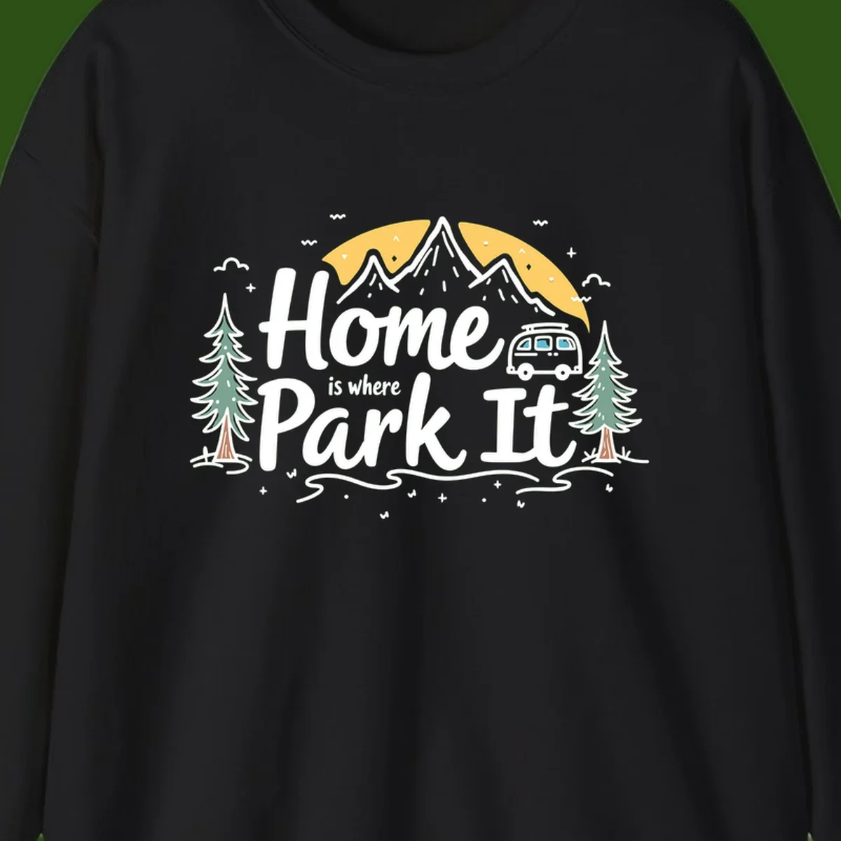 Illustrated design with mountains, camper van, pine trees, moon and clouds with 'Home is where I Park It' text