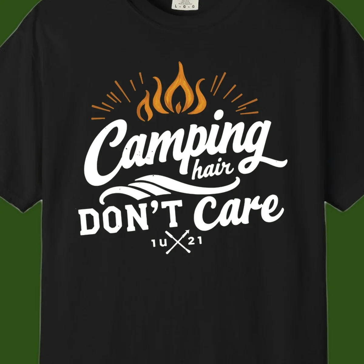 Camping hair don't care design with orange flame and radiating light rays in white lettering on gray background